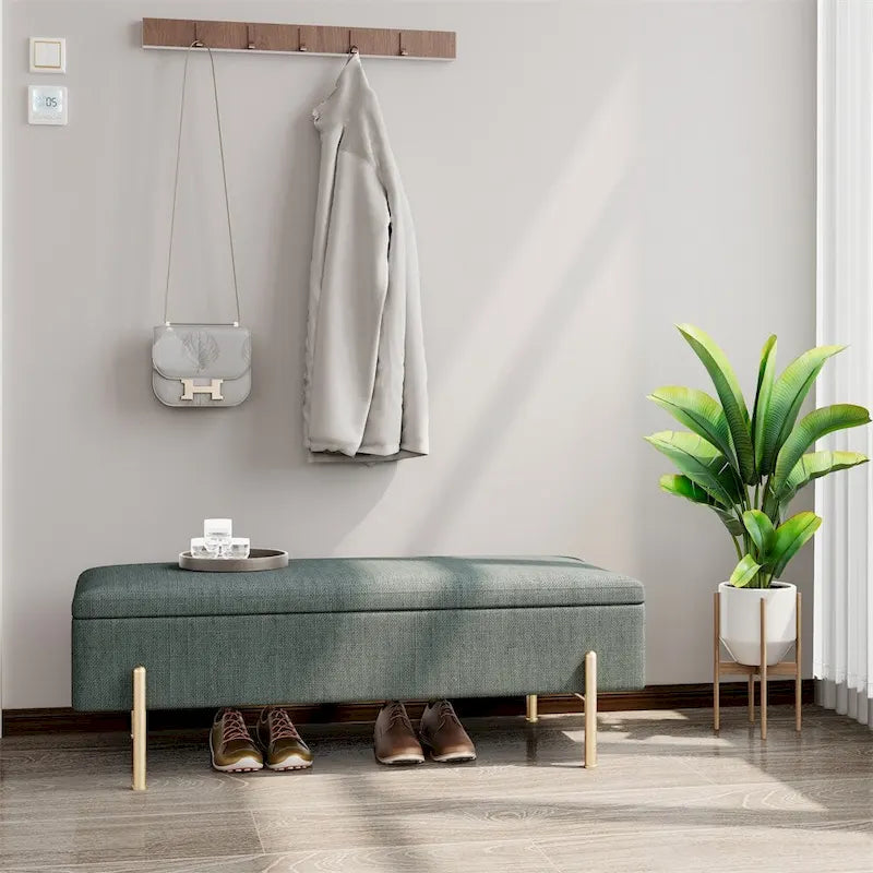 Banc de rangement capitonné en chenille verte avec pieds en métal doré